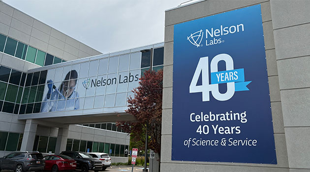 nelson labs outdoor banner on corporate offices
