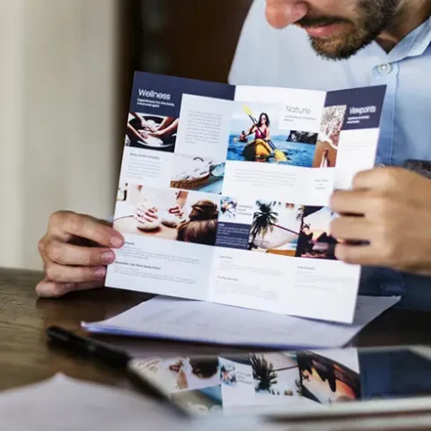 sales respresentative displaying brochure