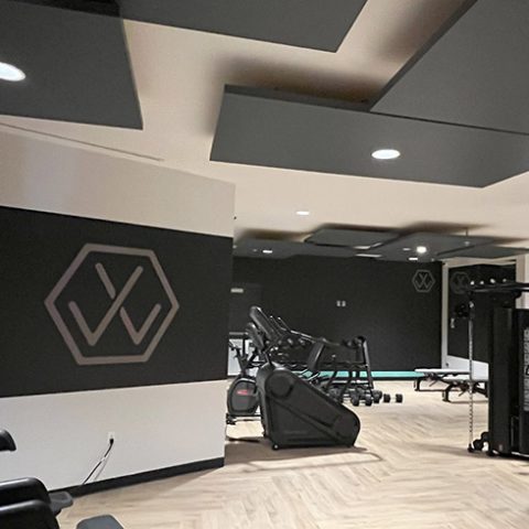 apartment gym branded environment with wall graphics and design